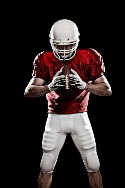 Joueur de football avec numéro sur un uniforme rouge