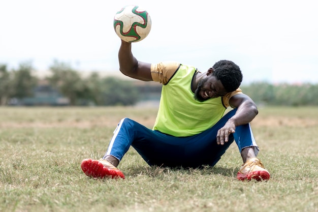 Joueur de football en pause