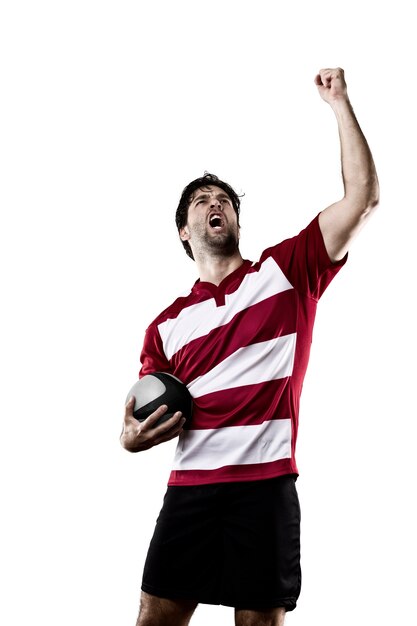 Joueur de rugby dans un uniforme rouge.