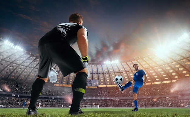 Joueurs de football en action sur un stade professionnel