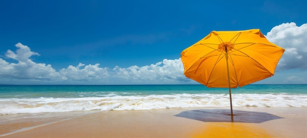 Une journée de plage sereine avec un parapluie orange et rouge vibrant sous un ciel bleu ensoleillé