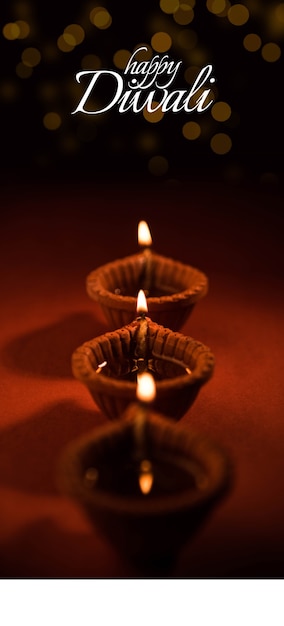 Joyeux diwali ou joyeux deepavali carte de voeux créative réalisée à l'aide d'une photographie de diya ou de lampe à huile