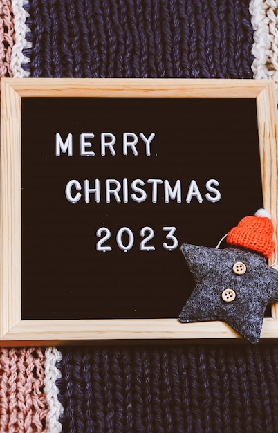Joyeux Noël lettrage sur tableau à lettres minimaliste fond de nouvel an 2023