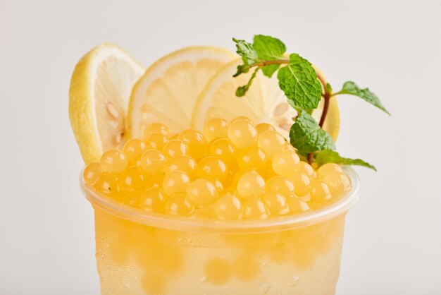 Jus de thé saveurs citron et topping