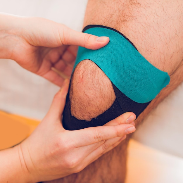 Kinesio taping pour les douleurs au genou