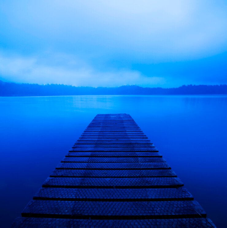 Photo lac paisible tranquille avec jetée, nouvelle-zélande.