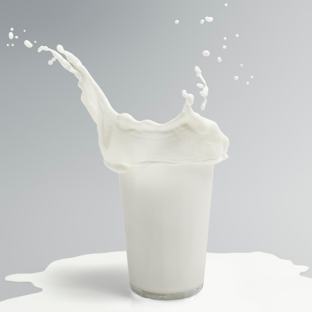 Lait frais éclaboussant d'un verre