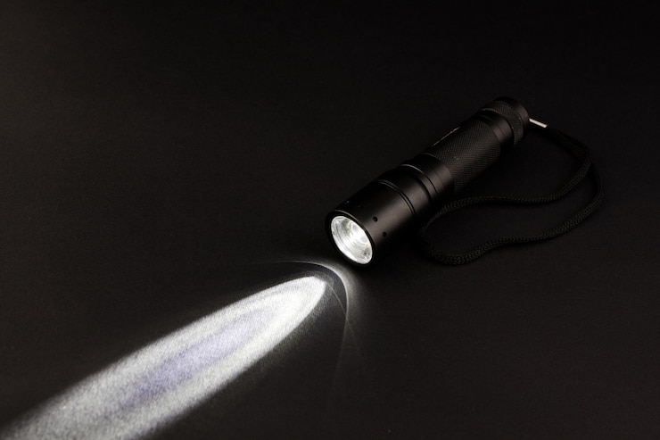 Photo lampe de poche avec un faisceau lumineux