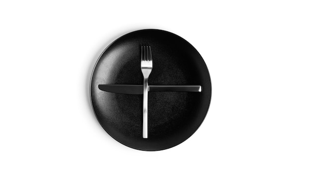 Langue des signes avec couverts. Une assiette avec des couverts isolé sur fond blanc. Assiette, couteau, fourchette sur fond blanc. photo de haute qualité