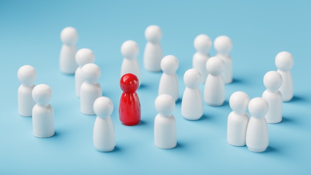 Photo le leader en rouge mène un groupe d'employés blancs vers la victoire, les rh, le recrutement du personnel. le concept de leadership.