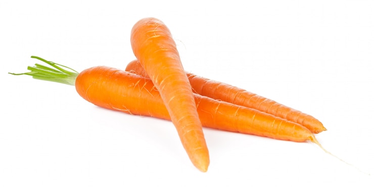 Photo légume de carotte isolé sur blanc
