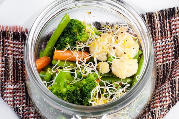 Les légumes blanchis Haricots brocoli chou-fleur et carottes