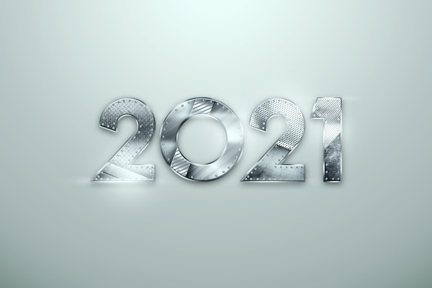 lettrage de nouvel an 2021 avec des chiffres en métal sur fond clair.