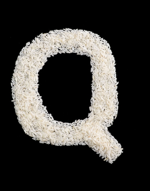 Lettre d'alphabet de grain de riz blanc