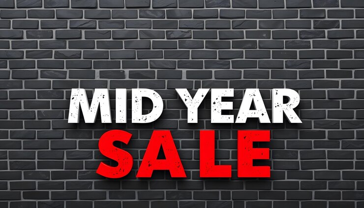 Photo lettre de vente à mi-année sur le mur de briques noires pour la vente promotionnelle et pour la vente de dégagement et pour