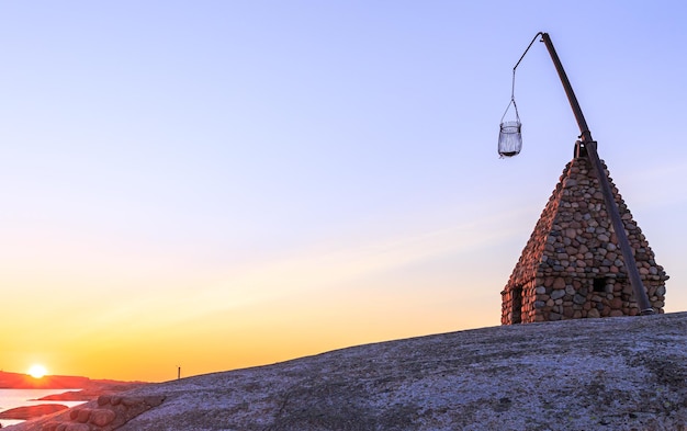 Photo le lever du soleil au bout du monde - vippefyr ancien phare à verdens ende en norvège