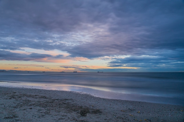 Lever du soleil sur la plage de Saler, photographie longue exposition