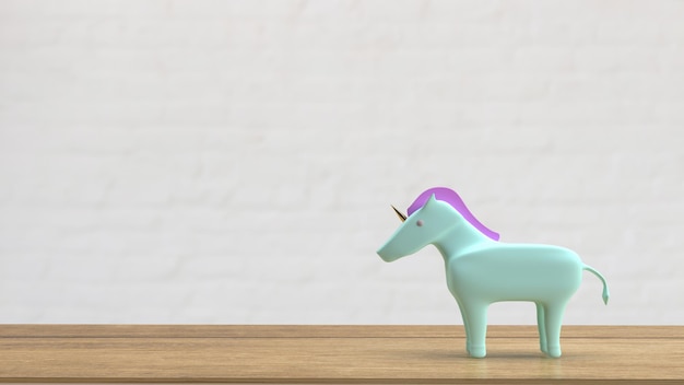 La licorne sur table en bois pour le rendu 3d du concept d'entreprise