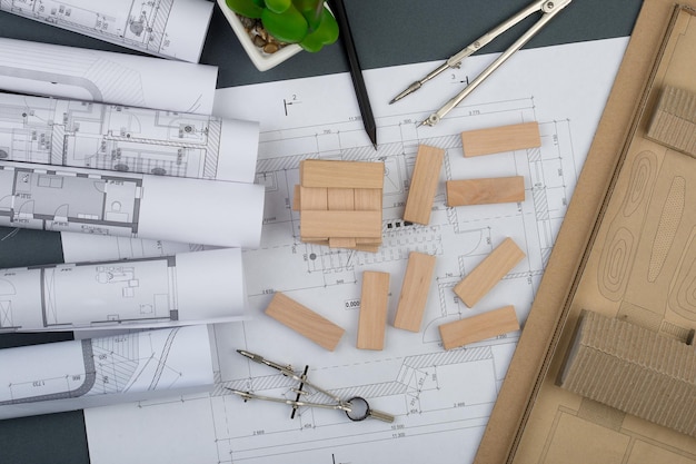 Lieu De Travail D'une Maison Modèle D'architecte à Partir D'outils D'ingénierie De Dessins De Construction De Blocs De Bois