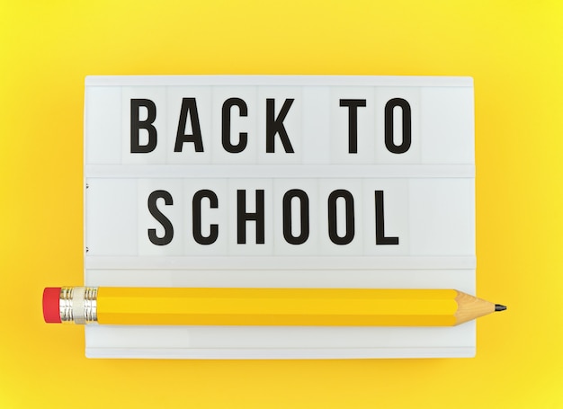 Lightbox avec le texte BACK TO SCHOOL et un gros stylo amusant sur jaune