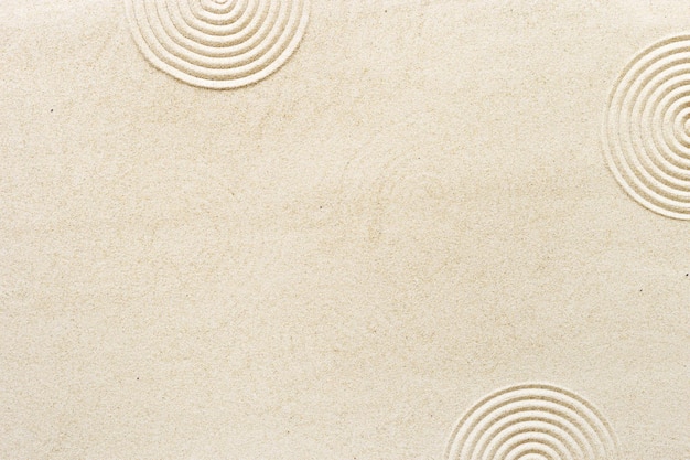 Lignes de cercle sur le sable belle texture sablonneuse Fond de sable naturel pour le concept de bien-être spa