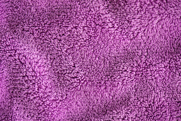 Lilas délicat fond doux de fourrure en peluche tissu lisse. Texture de textile de couverture molletonné doux violet