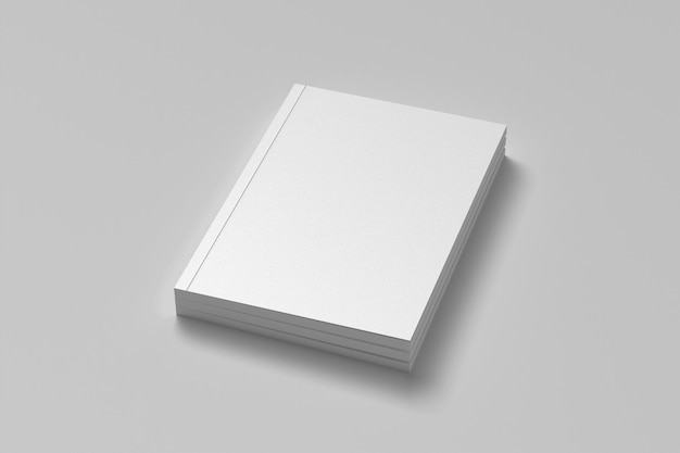 un livre blanc avec une couverture blanche est posé sur un fond gris