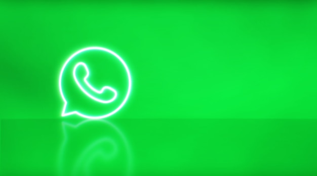 Logo Whatsapp en néon avec un espace pour le texte et les graphiques. Fond vert.