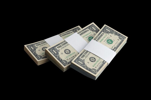 Lot de billets en dollars américains isolés sur fond noir Pack d'argent américain avec une haute résolution sur fond noir parfait