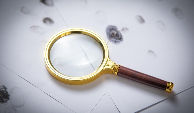 Loupe et empreintes digitales Detective Investigation