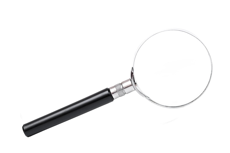 Photo une loupe sur un fond blanc