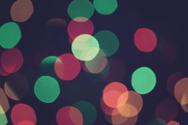 Lumières bokeh. Fond d'écran défocalisé cercles bokeh vert et rouge. Bokeh de vacances. Noël. Nouvelle année.