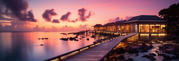 Photo des lumières led douces ornent des villas de luxe au milieu d'un magnifique paysage marin tropical.