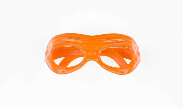 Photo lunettes jouet orange isolé sur fond blanc