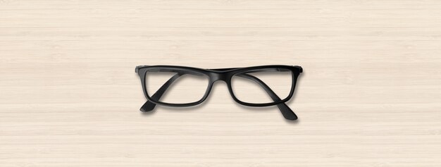 Lunettes noires isolés sur bois blanc