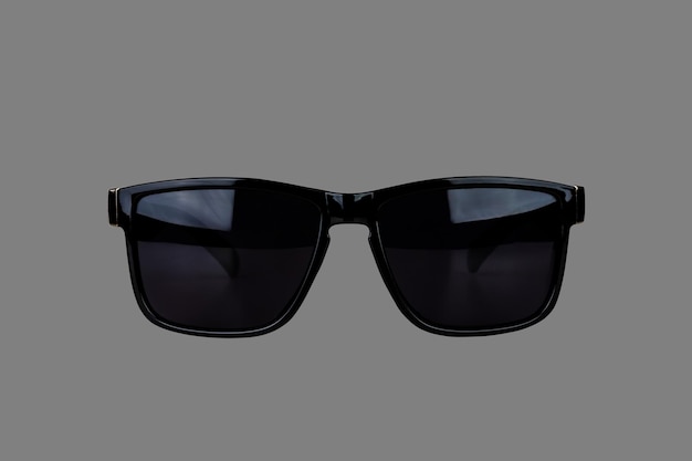 Photo lunettes de soleil mâles noirs isolés sur fond gris