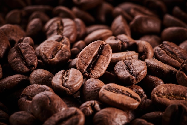 Macro de grains de café torréfiés close up background