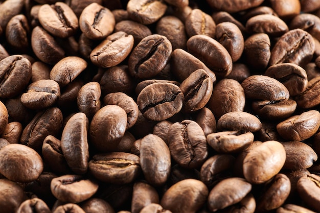 Macro de grains de café torréfiés close up background