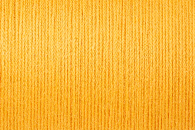 Macro image de fond de texture de fil jaune