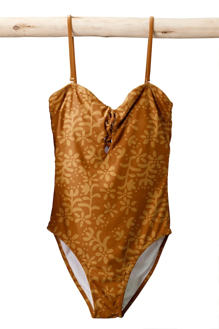 Photo le maillot de bain monokini floral doré