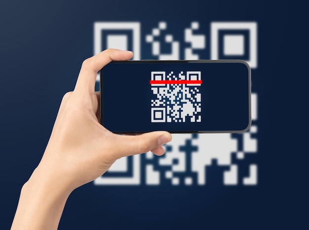 Main à l'aide d'un téléphone intelligent scannant le code Qr Lecteur de code-barres Paiement par code Qr Technologie sans numéraire Concept d'argent numérique