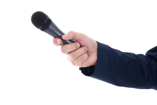 Main masculine avec microphone isolé sur blanc