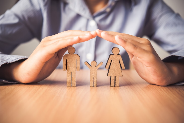 Photo main protégeant les gens de la famille icône - l'assurance.
