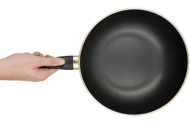 main tenant une casserole vide sur fond blanc