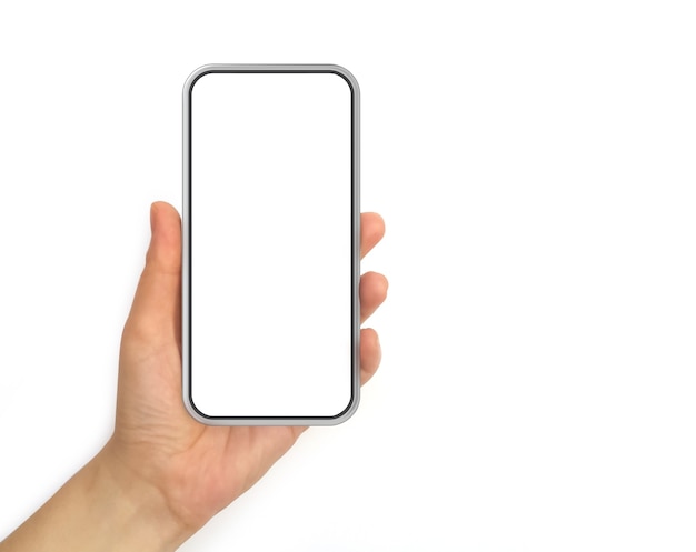 Main tenant un téléphone portable avec écran blanc