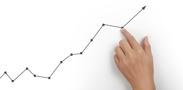 Main touchant un graphique d'indicateur financier et tableau d'analyse de l'économie de marché comptable