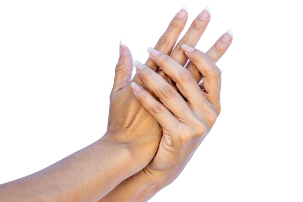 Photo les mains d'une femme avec de longs ongles sans peinture ou retouches