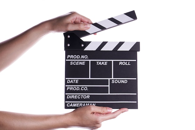 Mains tenant le concept de clapper board ou d&#39;ardoise.