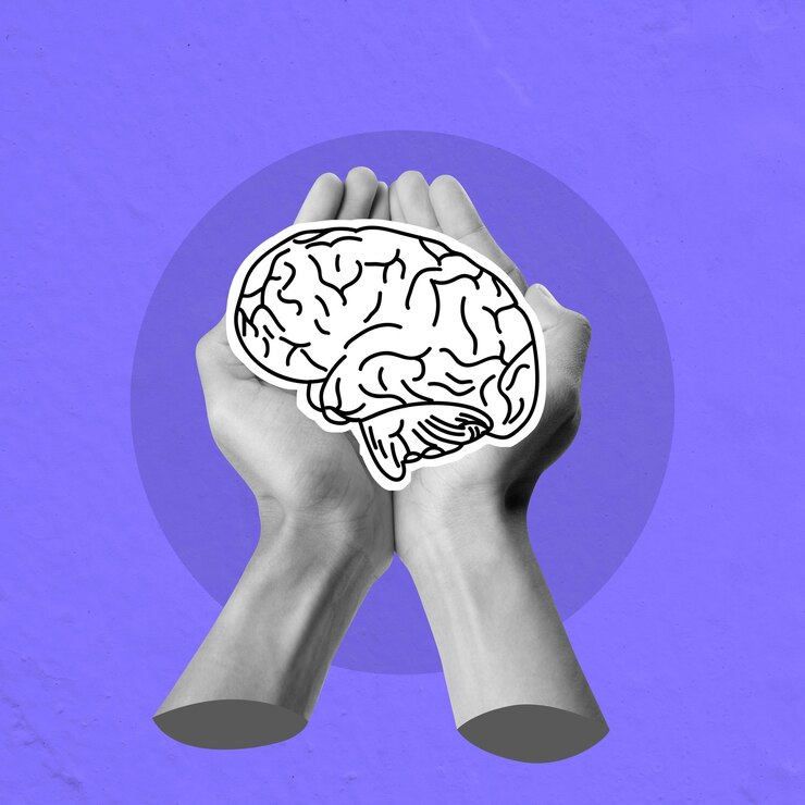 Photo mains tenant du papier cerveau montrant le concept de santé mentale