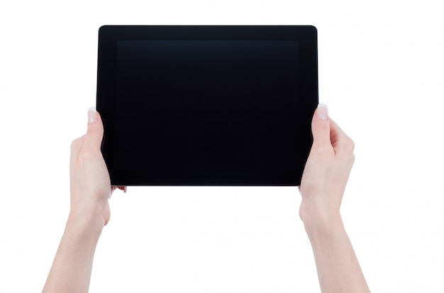 Mains tenant un gadget d'ordinateur tablette tactile avec écran isolé